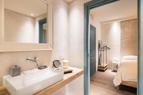 Un ou plusieurs lits dans un hébergement de l'établissement ASILO in BAROLO - La Villa
