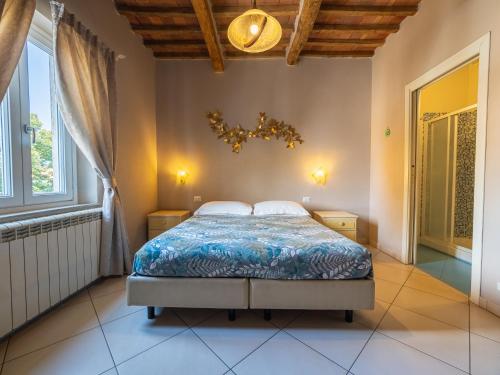 Una cama o camas en una habitación de B&B Alma