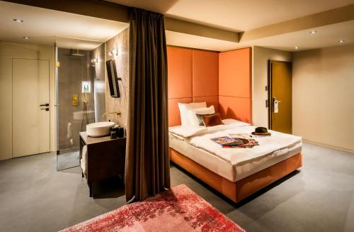 Postel nebo postele na pokoji v ubytování Design-Hotel JAMS