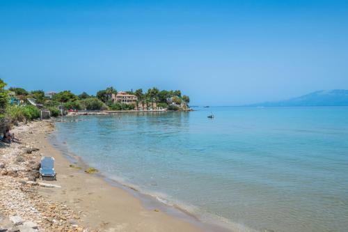 a view of a beach and the water at Kozanos Studios 1 in Amoudi