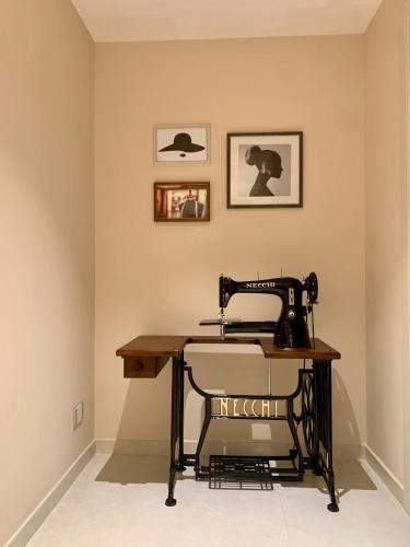 a sewing machine sitting on a table in a room at Anna House in San Marco dei Cavoti