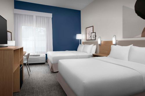 Кровать или кровати в номере Spark By Hilton San Antonio Airport