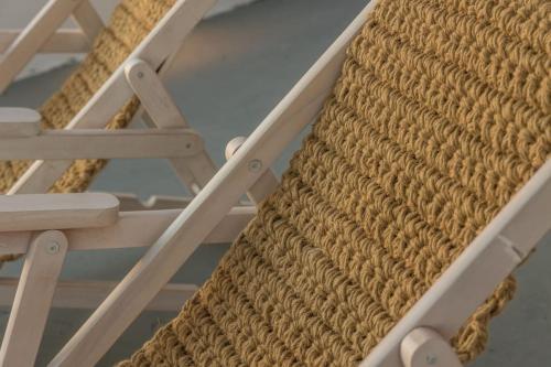 a set of stairs in a room at Milos Trypiti sunset delux studio in Tripití