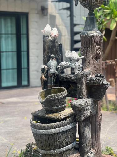 Κήπος έξω από το Sasi Nonthaburi Hotel