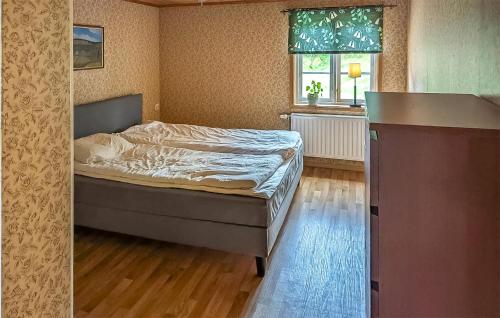 Katil atau katil-katil dalam bilik di 1 Bedroom Nice Home In Rörvik