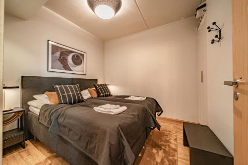 Ένα ή περισσότερα κρεβάτια σε δωμάτιο στο Ski Chalet C27 by Aavalevi Holidays, Levi Center incl 2 ski passes