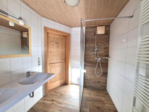 Koupelna v ubytování Ferienhaus Hinterhabneralm