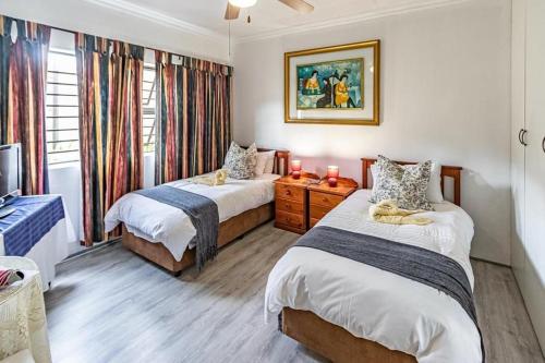 Postel nebo postele na pokoji v ubytování DeRust Danabay Accomodation