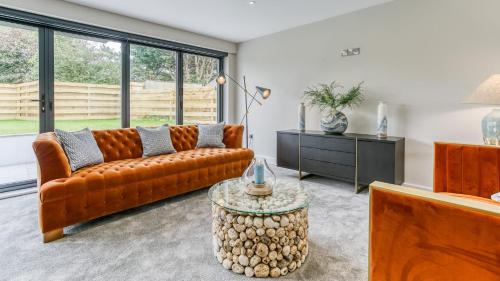 a living room with a couch and a table at The Nook in Valley