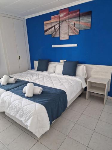 Postel nebo postele na pokoji v ubytování Europa Family Apartments