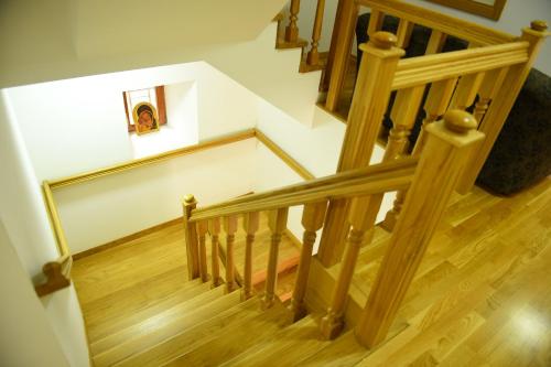 an overhead view of a wooden staircase with wooden floors at Old House Bozovic in Nikšić