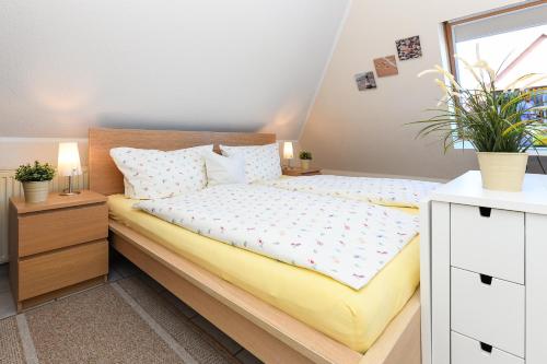 Ένα ή περισσότερα κρεβάτια σε δωμάτιο στο Apartments im Haus Friedeburg