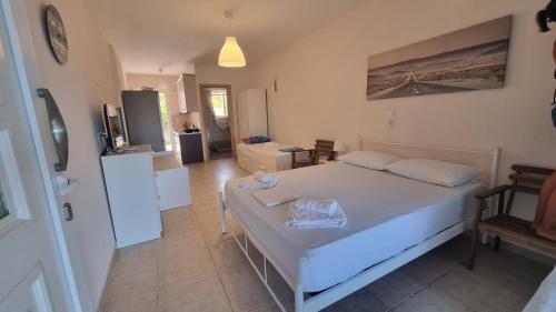 Postel nebo postele na pokoji v ubytování Ionian Dream Home