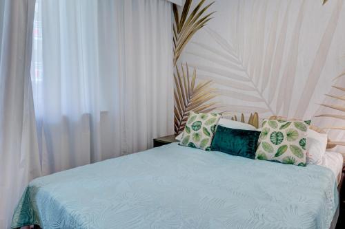Postel nebo postele na pokoji v ubytování Apartamenty Zdrojowa