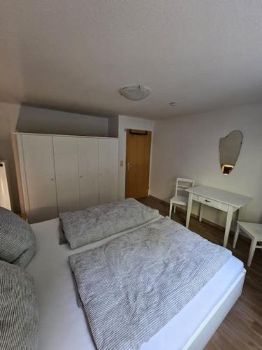 Postel nebo postele na pokoji v ubytování Haus Felsenschlucht