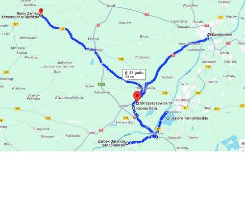a map of a road with a red marker at Domek wśród Jabłonek in Łoniów