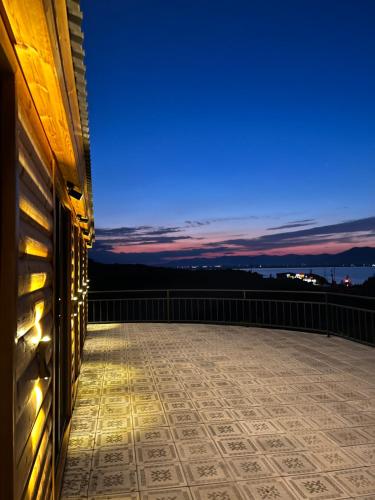 a view from the roof of a building at night at Cascade Resort Sevan in Sevan