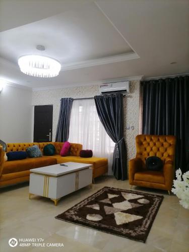 Posezení v ubytování Cozy Suites
