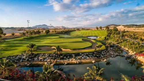 an aerial view of the golf course at the resort at Phoenix Pool & Golf View Villa Cam Ranh in Cam Ranh