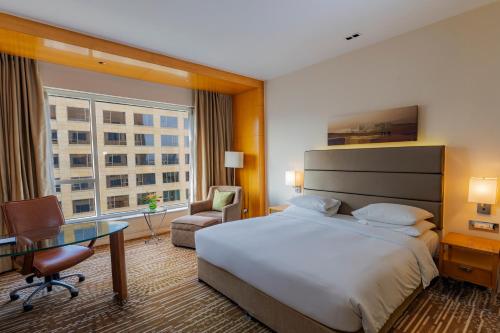 Postel nebo postele na pokoji v ubytování Hyatt Regency Pune Hotel & Residences