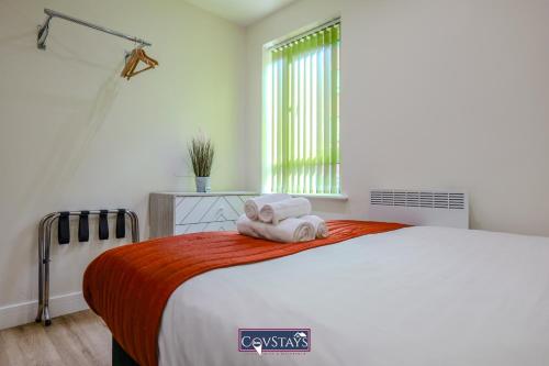 Postel nebo postele na pokoji v ubytování Beauchamp House - Apartment in Coventry City Centre by CovStays