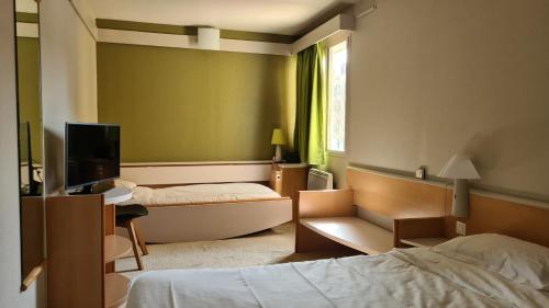 Postel nebo postele na pokoji v ubytování Sweet Home