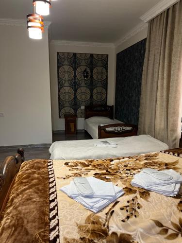 Кровать или кровати в номере COMFORT M Guest House