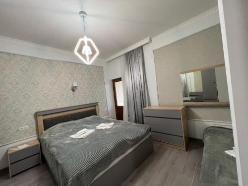 Кровать или кровати в номере COMFORT M Guest House