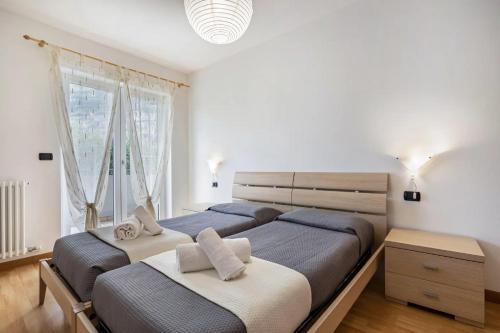 Postel nebo postele na pokoji v ubytování Agritur Laura