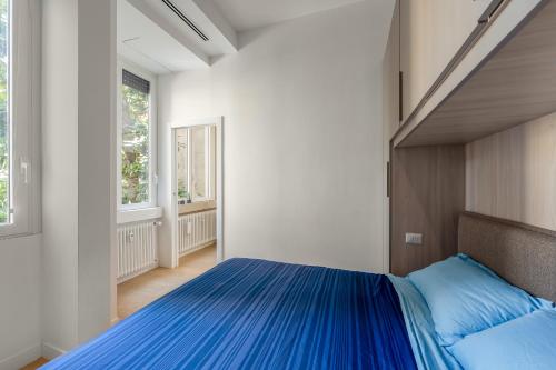 Ένα ή περισσότερα κρεβάτια σε δωμάτιο στο Porta Venezia New Luxury apt - wifi full equiped