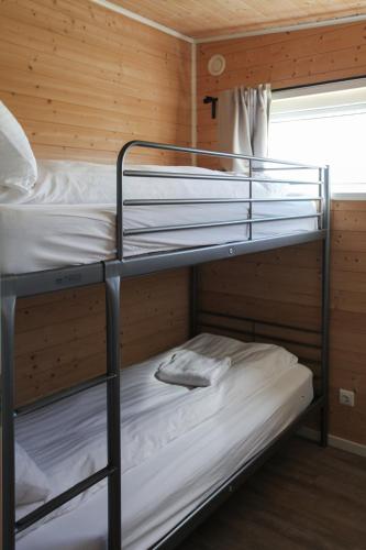 Una cama o camas en una habitación de Hestheimar