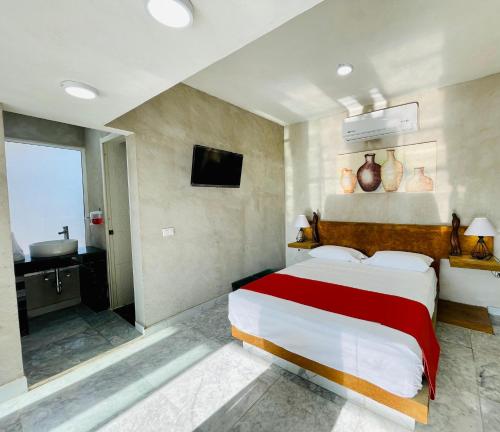 Katil atau katil-katil dalam bilik di Villas Coco Mare Suite 2