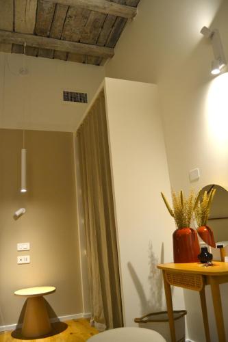 Postel nebo postele na pokoji v ubytování Everyday Apartments Corte Petroni