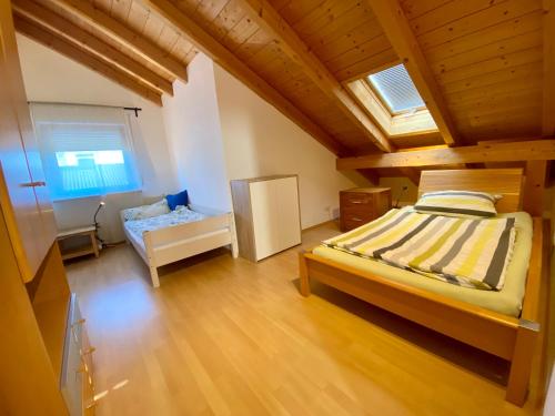Postel nebo postele na pokoji v ubytování Haus Aschauer am Amtmannfeld