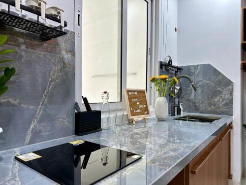 Kuchyň nebo kuchyňský kout v ubytování HOD Apartment Da Kao