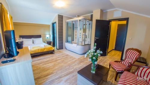Ένα ή περισσότερα κρεβάτια σε δωμάτιο στο Apartments Cavaliero