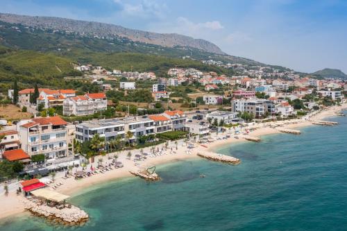 an aerial view of a beach in a resort at Paoma Luxury Beach Suite with jacuzzi in Podstrana