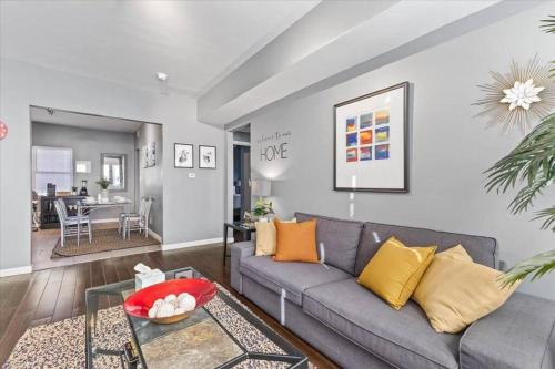 a living room with a couch and a table at Sleep 5 - Pet & Baby - Laundry - Closer to Hospitals in Indianapolis
