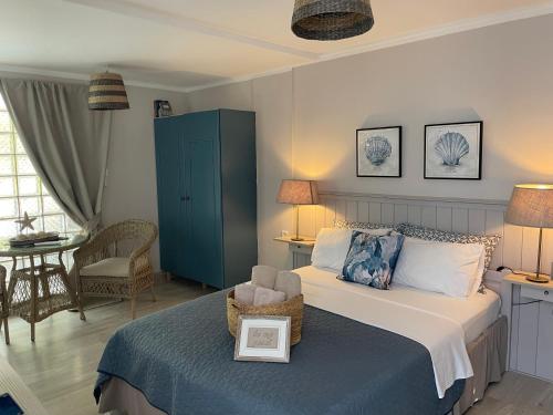 Postel nebo postele na pokoji v ubytování ThePoolhouse Artemida