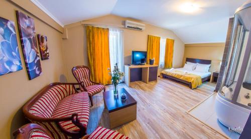 Ένα ή περισσότερα κρεβάτια σε δωμάτιο στο Apartments Cavaliero