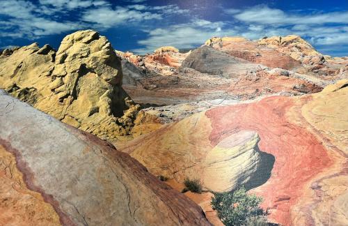 a view of a desert with colorful rocks at North Shore Inn at Lake Mead in Moapa Valley