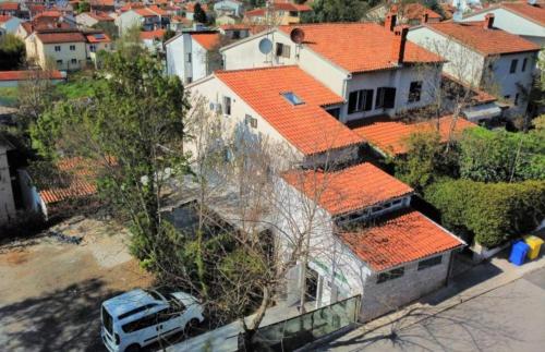 an aerial view of a house with orange roofs at Apartments Mare in Pula