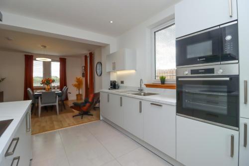 Η κουζίνα ή μικρή κουζίνα στο St Annes - Cosy cottage in Fife