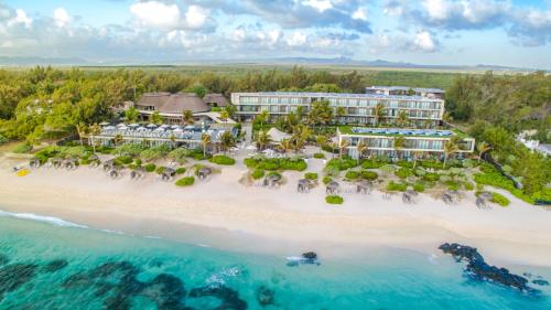 an aerial view of a resort on a beach at Radisson Blu Poste Lafayette Resort & Spa (Adults Only) in Poste Lafayette