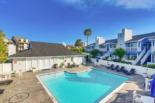 a swimming pool in the backyard of a villa at Galveston Couples Retreat quarter Mi to Seawall in Galveston