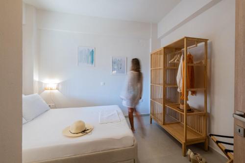 Ένα ή περισσότερα κρεβάτια σε δωμάτιο στο Stoupa Cosy Casa