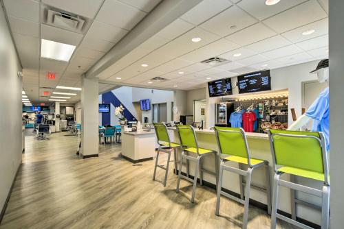 a store with green chairs and a counter at Keowee Key Condo with Lake Access and Community Pools! in Salem