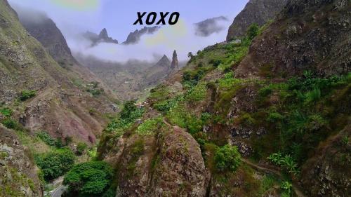 a view of a mountain valley in the sky at Pousada do Ceu in Paul