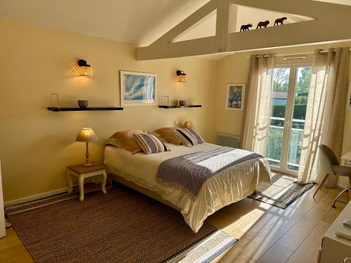 Postel nebo postele na pokoji v ubytování Villa à 5min de Bayonne avec Piscine chauffé et salle de sport