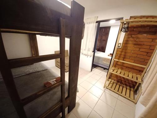 Ένα ή περισσότερα κρεβάτια σε δωμάτιο στο Hostel Mochiliers Bed and Breakfast
